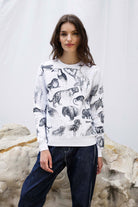 Sweatshirt Macarron Desaparicion Blanc sweatshirt femme, pièce basique et vêtement cocooning du quotidien